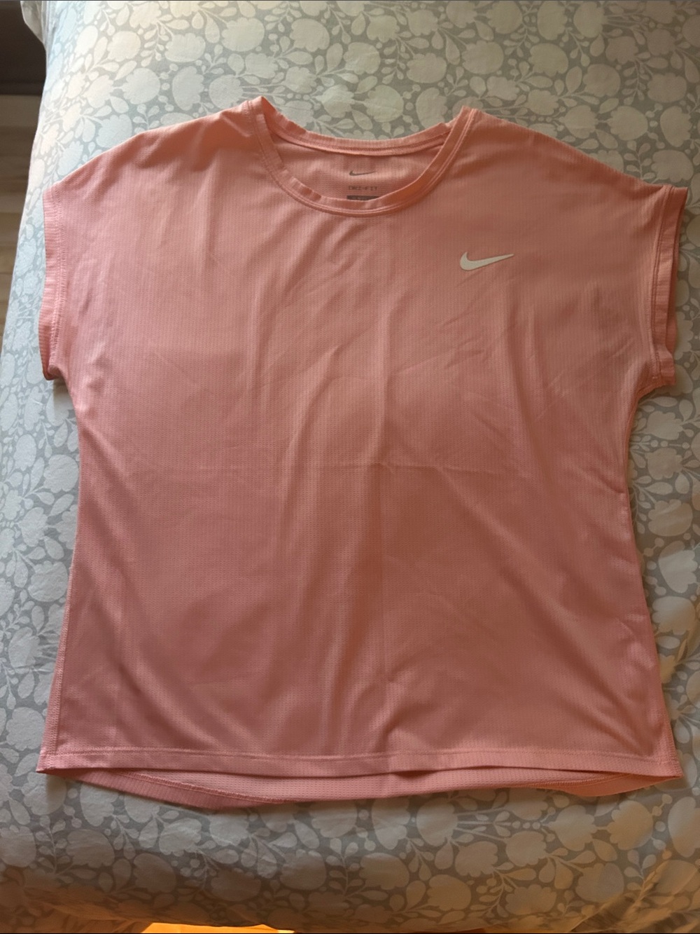 Nike Women’s Coral Pink Short Sleeve Dri-FIT Tee